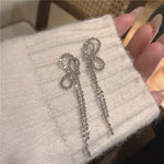 Silver Bow Tassel Earrings